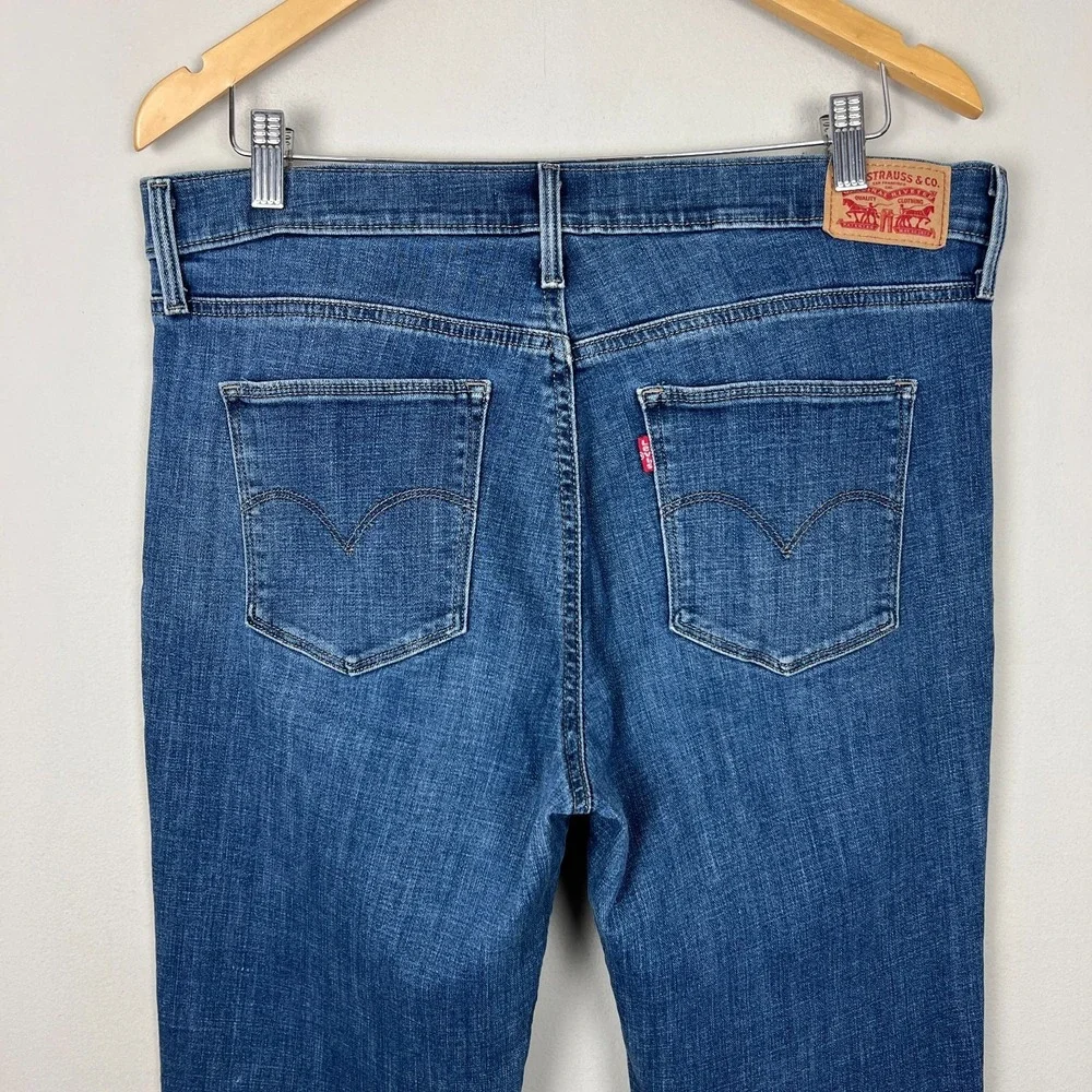 Levis Slimming Straight Jeans Womens 32 Blue Stretch Denim Medium Wash Pockets - Picture 5 of 15
